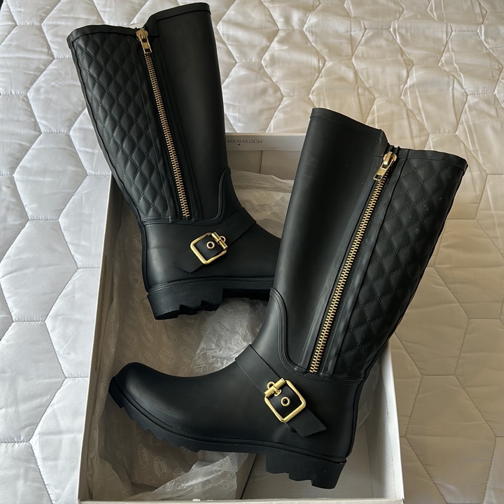 Steve Madden rubber boots.